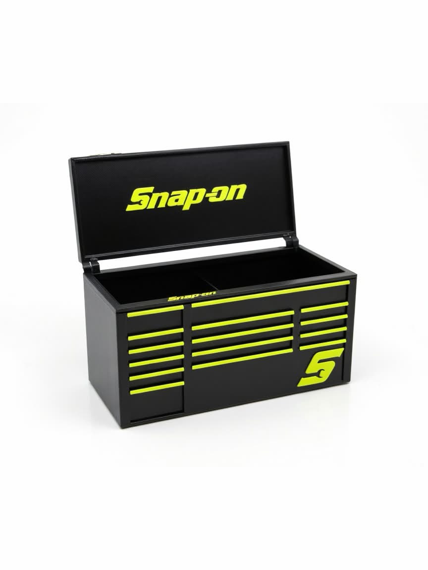 Small black and lime 3D printed garage-style mini tool box with open lid and drawer-detail front.